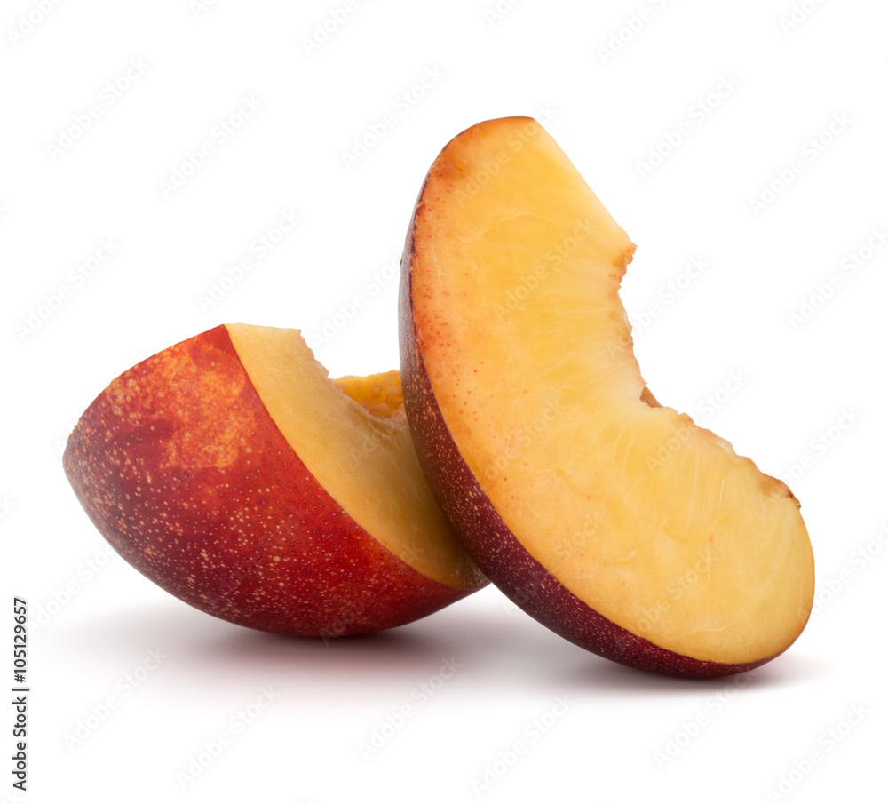 Nectarine fruit slice isolated on white background close up Nectarine fruit slice isolated on white background close up