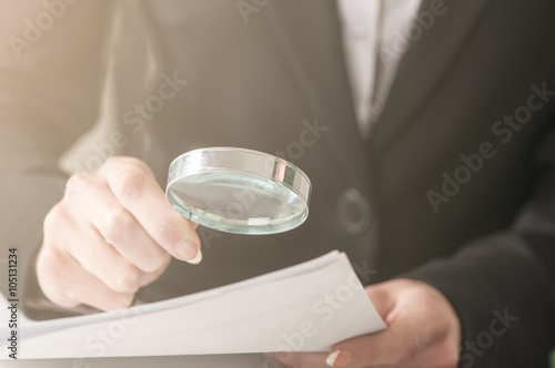 businessman looking at a document