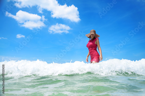 Carefree young woman enjoying clear tropical water © Gerisima