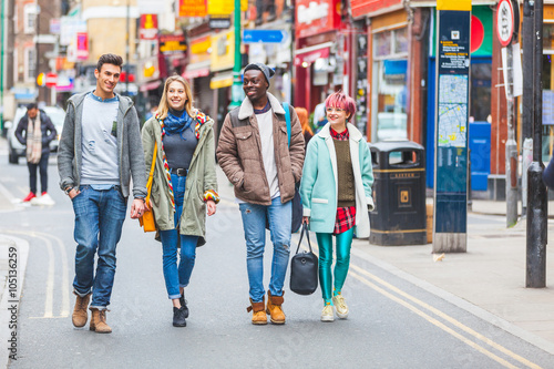 Photography Group of young friends walking in London