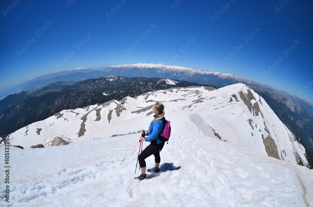 Girl  hiking .Snow on the top of the Tahtali mountain in Turkey