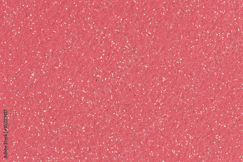 Christmas pink background with glitter. Low contrast photo.