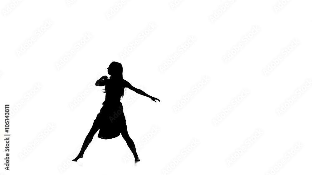 Slim woman dancer dancing contemporary dance and jumps, on white, silhouette, slow motion Slim woman dancer dancing contemporary dance and jumps, on white, silhouette, slow motion