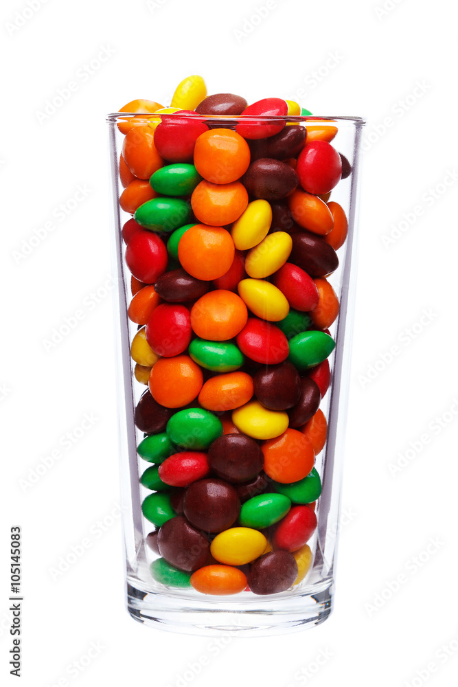 multi colored caramel sweets and chocolate candies in glass isol multi colored caramel sweets and chocolate candies in glass isol
