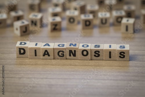 Diagnosis written in wooden cubes photo