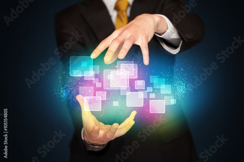 man holding abstract icons