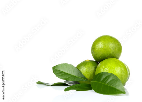 Lime with leaf on a white background. © bajita111122