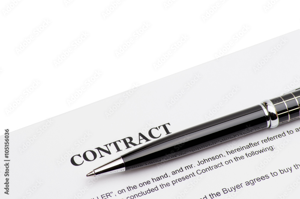 Close-up of pen on contract Close-up of pen on contract