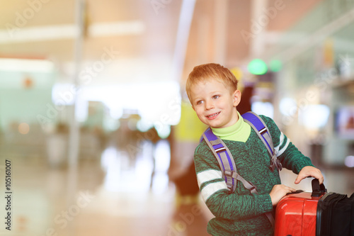 little boy travel in the airport