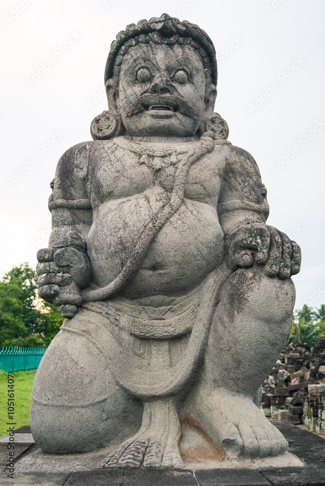 A statue at the entrance to the Sewu ancient Buddhist temple, Central Java, Indonesia.
