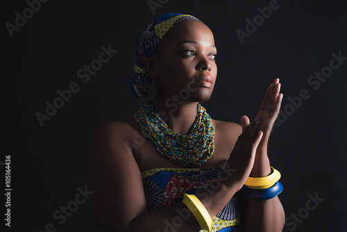 South african xhosa woman wearing colorful necklace and bracelet photo