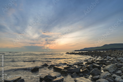 Beautiful sunset landscape image of rocky coastline in Kimmeridg © veneratio