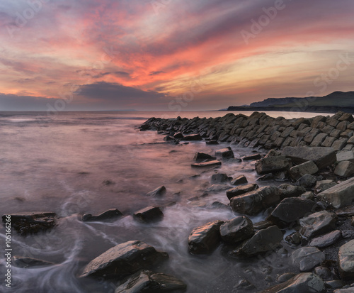 Beautiful sunset landscape image of rocky coastline in Kimmeridg © veneratio