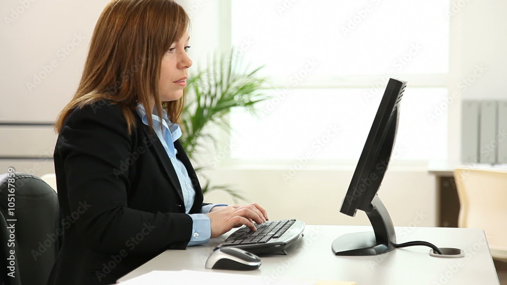 Business woman gets money from computer Business woman gets money from computer