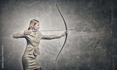 Woman aiming her goal