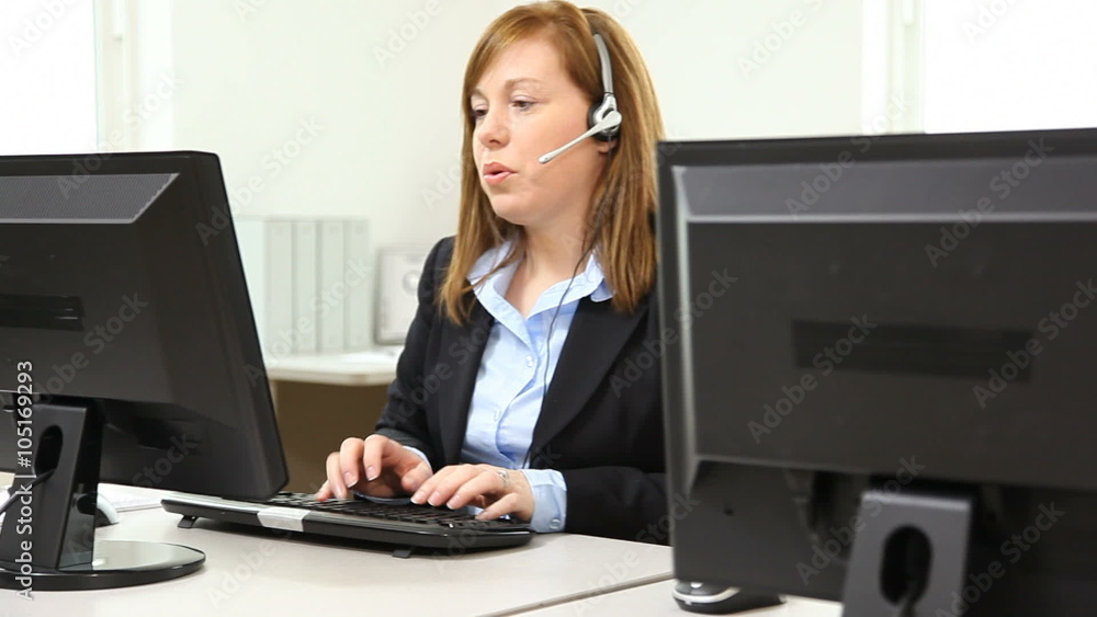 Customer service people at computers Customer service people at computers