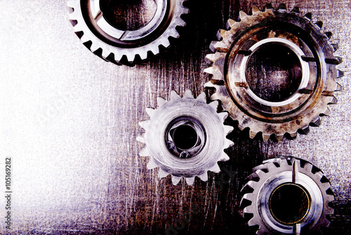 Gears on a metal background