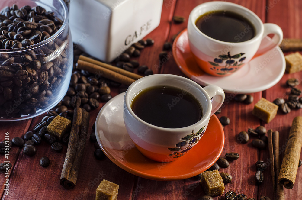 brewed coffee and coffee beans with cinnamon brewed coffee and coffee beans with cinnamon