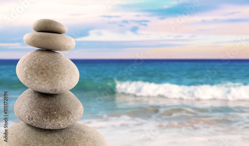 Balanced stones  sunny sea scene
