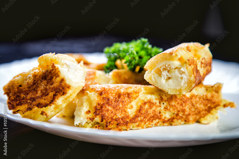Rolls of cheese and bread, a dish in cafe Rolls of cheese and bread, a dish in cafe