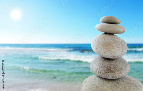 Balanced stones, sunny sea scene 