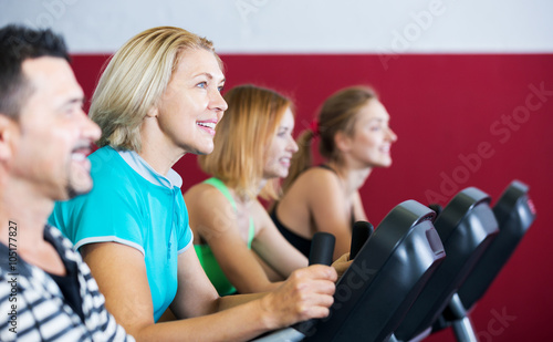 People training on exercise bikes together