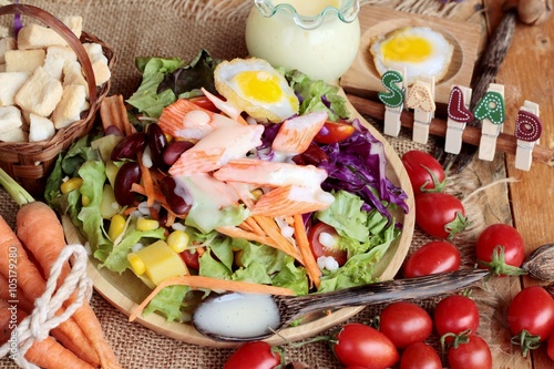 Fresh salad and egg with dressing delicious.