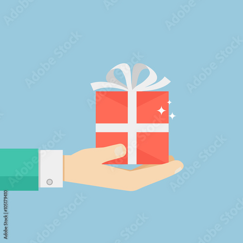 Hand holding or offering gift or present
