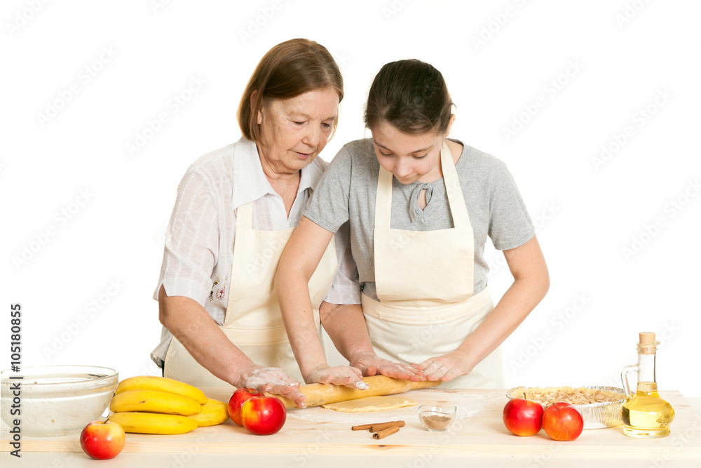 the grandmother and the granddaughter roll dough