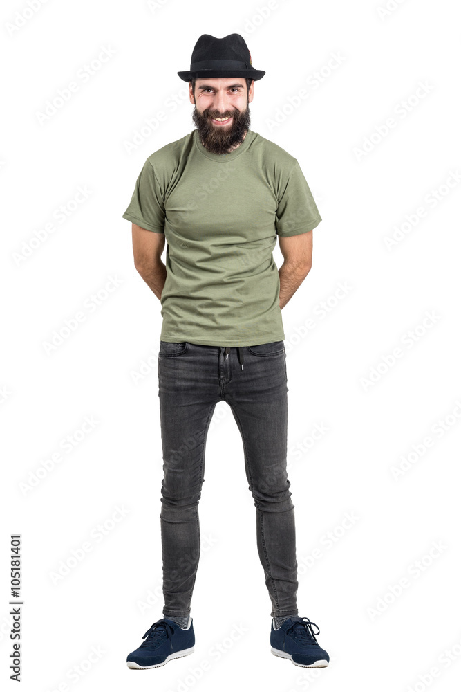 Laughing bearded man with hat looking at camera. Full body length portrait isolated over white studio background. Laughing bearded man with hat looking at camera. Full body length portrait isolated over white studio background.