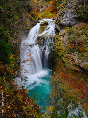 Fototapeta Naklejka Na Ścianę i Meble -  Waterfall in a mountain gorge. Ordesa National Park. Aragon Province. Spain