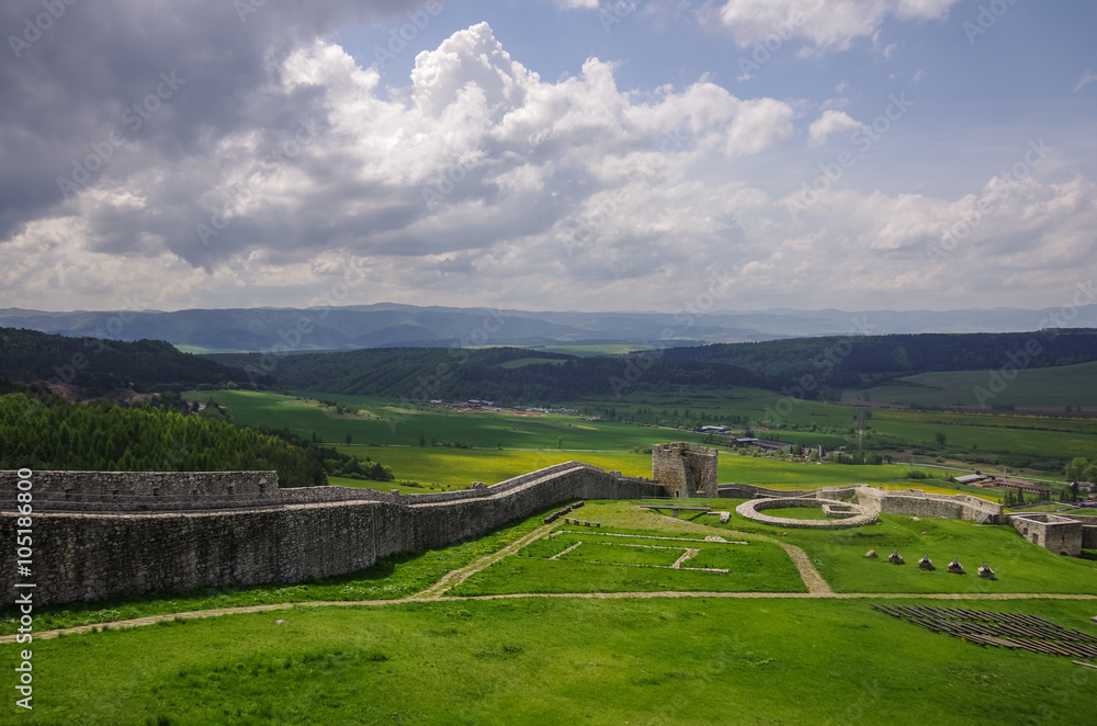 Inside the walls of Spis Castle with panorama of meadows - Spissky hrad National Cultural Monument (UNESCO) ruins of medieval castle, Slovakia