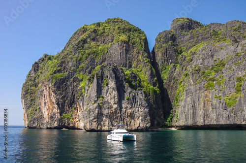 Yacht and beautiful limestone cliffs and clear sea of Phi Phi Leh south of Thailand, Krabi Province, Thailand, Asia