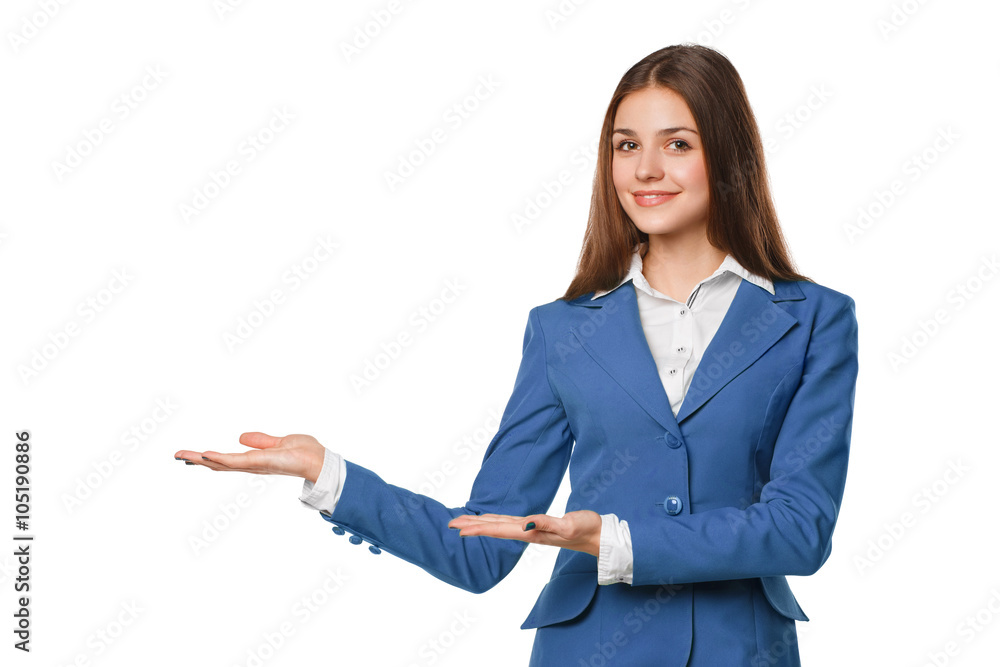 Smiling woman showing open hand palm with copy space for product or text. Business woman in blue suit, isolated over white background Smiling woman showing open hand palm with copy space for product or text. Business woman in blue suit, isolated over white background