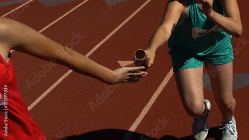 Running passing baton in relay
