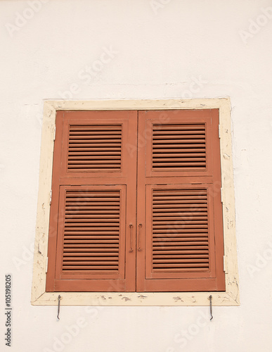 Wood windows on the white wall
