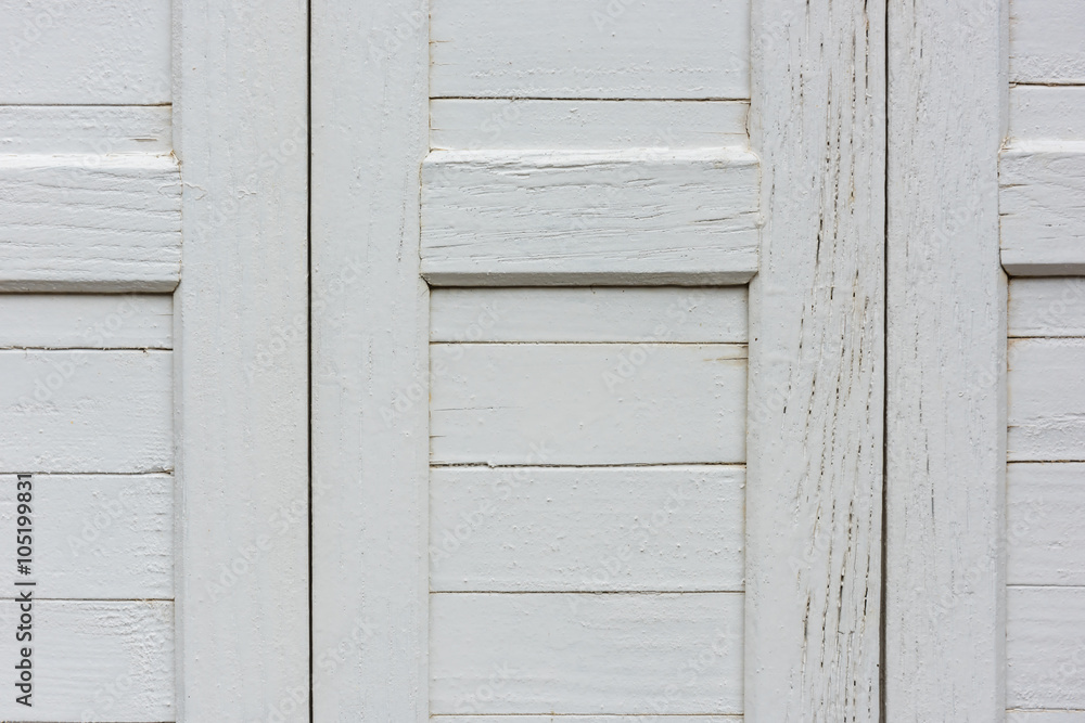 window with closed beige wooden shutters window with closed beige wooden shutters