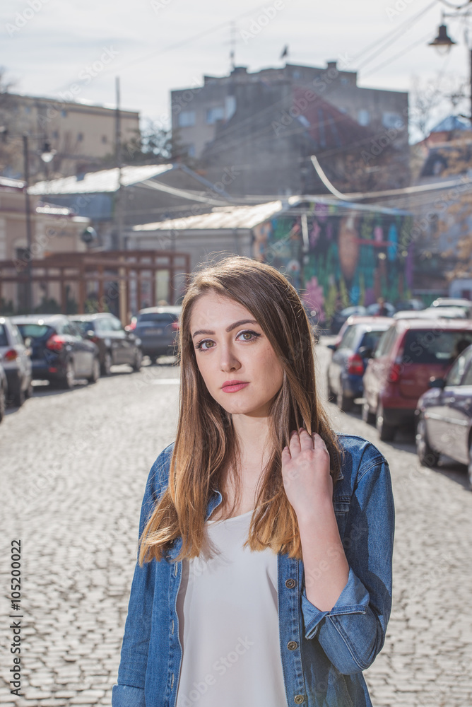 Beautiful girl in a photo shoot in the city