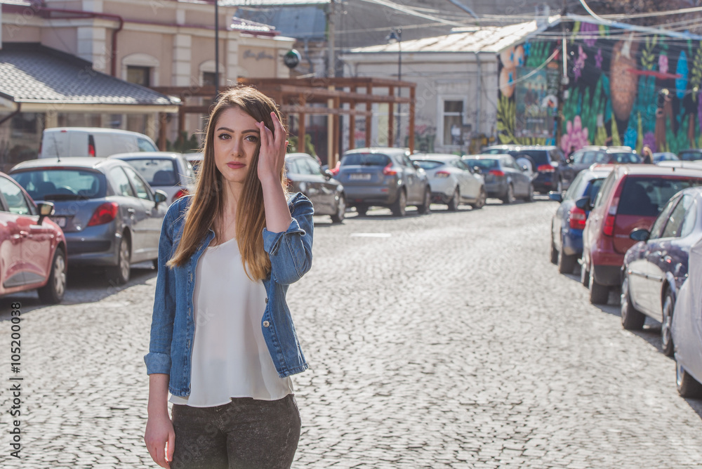 Beautiful girl in a photo shoot in the city