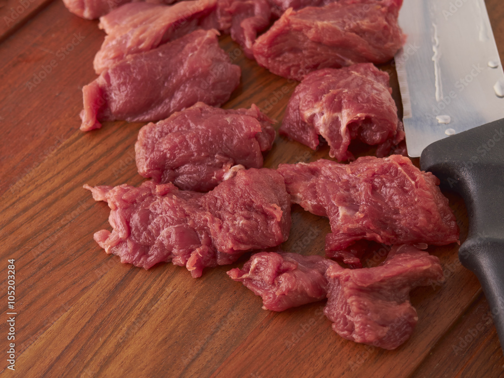 cooking a meat dish. cooking a meat dish.