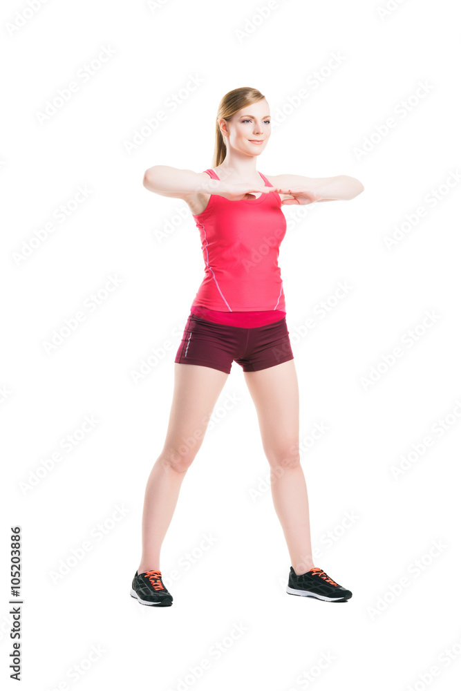 Fit, healthy and sporty woman doing an exercise Fit, healthy and sporty woman doing an exercise