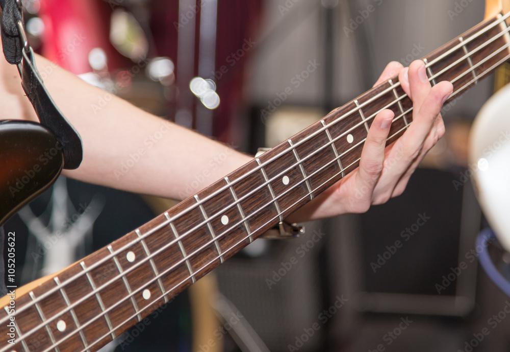 Fototapeta premium aggressive play guitar on stage