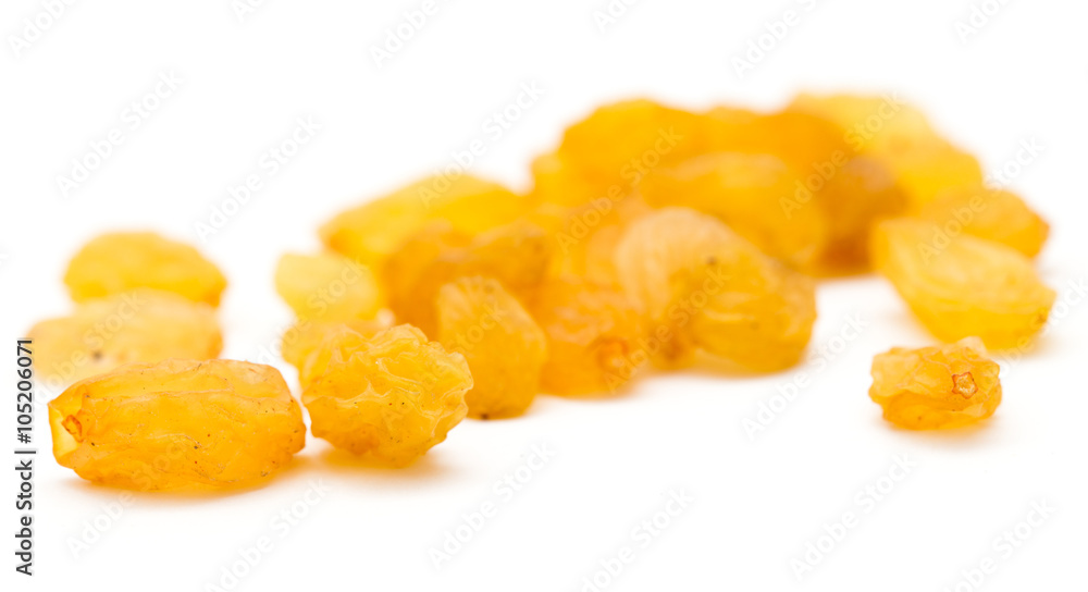 Golden raisins on a white background Golden raisins on a white background