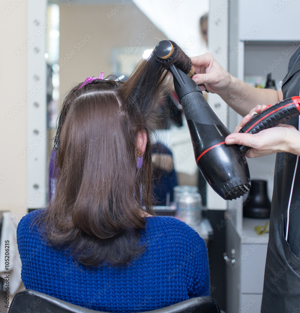 Fototapeta premium blow-drying in a beauty salon