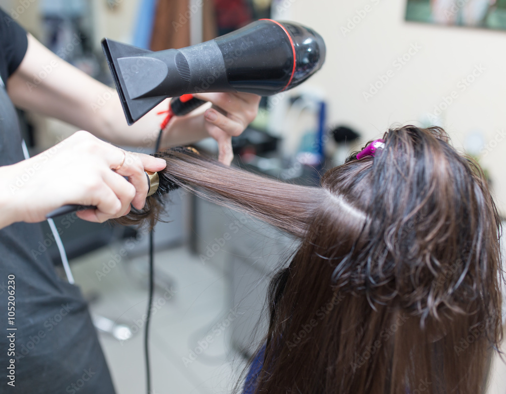 Fototapeta premium blow-drying in a beauty salon
