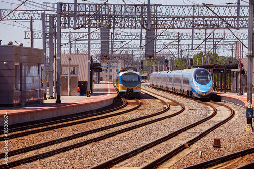 Obraz na płótnie Train on the platform of railway station in Gdynia, Poland. w salonie