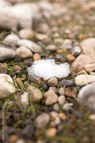 stones in the snow on the nature