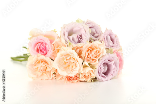 Bouquet of beautiful roses isolated on a white