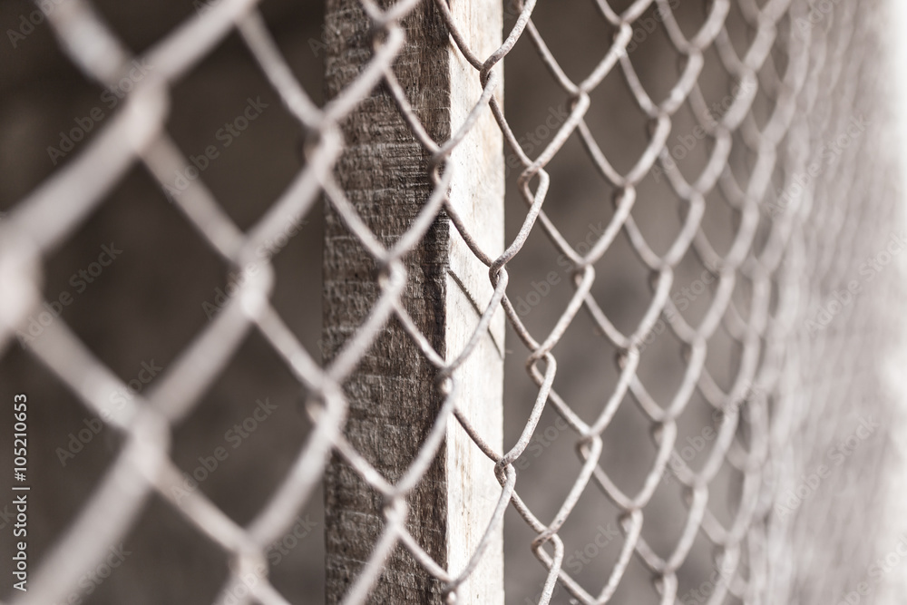 a fence of rusty metal mesh a fence of rusty metal mesh