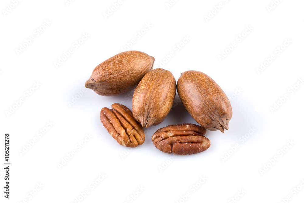 Few pecan nuts isolated on white Few pecan nuts isolated on white